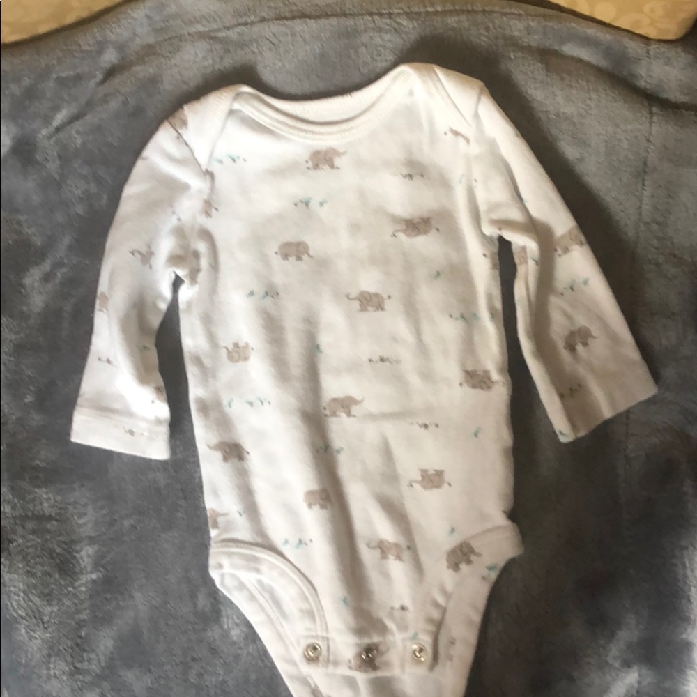 A gray and white onesie
